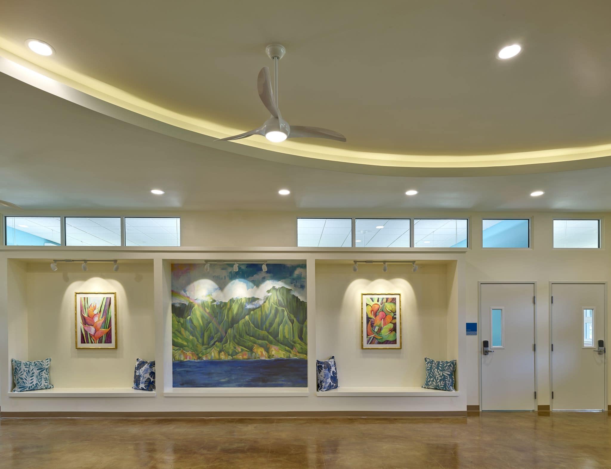 Various artwork on walls in open space