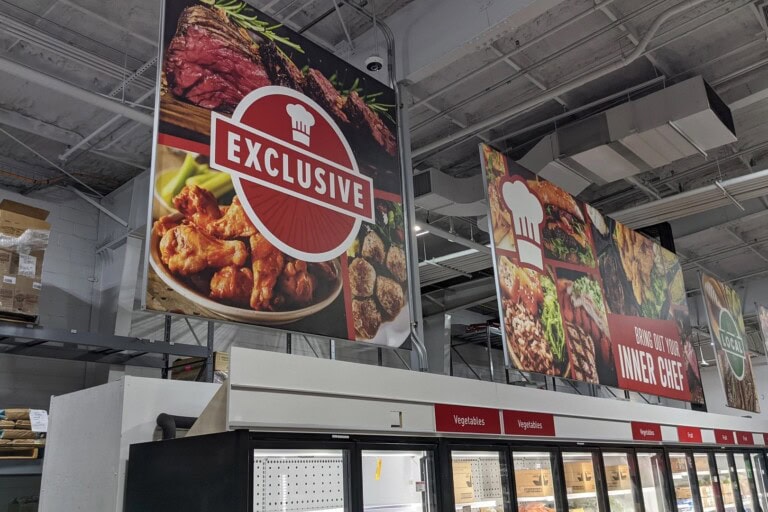 Multiple SEG fabric graphics installed above freezer