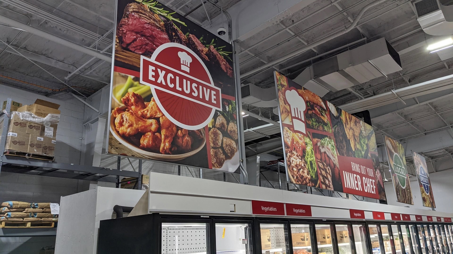 Multiple SEG fabric graphics installed above freezer